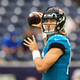 Trevor Lawrence #16 of the Jacksonville Jaguars warms up prior to the game against the Houston Texans at NRG Stadium on September 12, 2021 in Houston, Texas.
